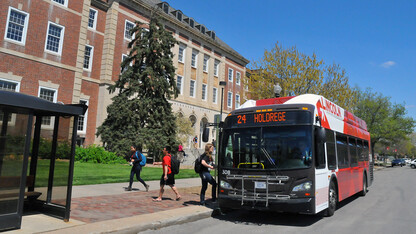 An intercampus bus makes a stop outside the Nebraska Union on April 29. UNL add two new bus routes in the fall, connecting City and East campuses with Nebraska Innovation Campus.