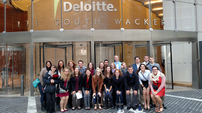 Students in the business learning community pose outside the Chicago office of Deloitte, an audit, consulting, tax and advisory service company, during the 2015 Big Trip. The group will return to Chicago for the 2016 Big Trip this week.