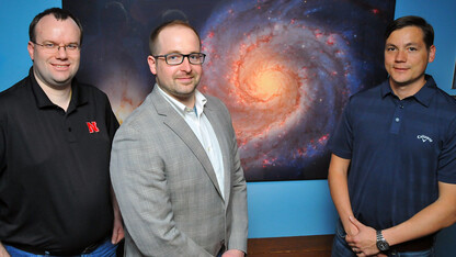 A research team that includes (from left) Peter Harms, Adam Vanhove and Mitchel Herian is helping NASA measure how lengthy space flights will effect the mental wellbeing of astronauts.