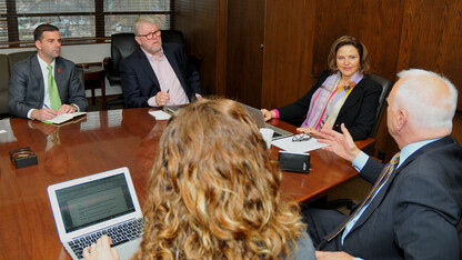 Liane Hentschke (fourth from left) meets with UNL's (from left) Josh Davis, David Wilson, Maegan Stevens-Liska and Tom Farrell on April 9. Hentschke, professor of music education at Federal University of Rio Grande do Sol in Porto Alegre, Brazil, has served in residence in the School of Music from April 6-10.