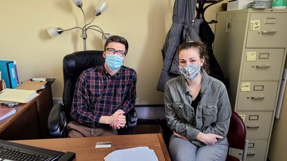 Emma Mays (right) with her internship supervisor Drew Miller, Director of Immigration at Catholic Social Services of Southern Nebraska.