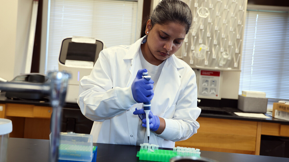Esha Kaler performs RNA extraction protocol in a lab in Entomology Hall on East Campus.