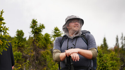 Trevor Frost takes a photo amid the Alaskan wilderness.