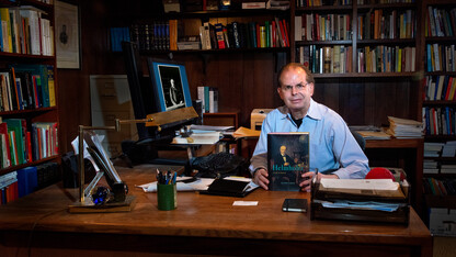 David Cahan holds a copy of the biography he authored, "Helmholtz: A Life in Science."