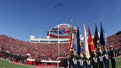Air Force T-38 trainers fly over Memorial Stadium during the national anthem prior to the Cornhuskers game with the University of Maryland on Nov. 19.