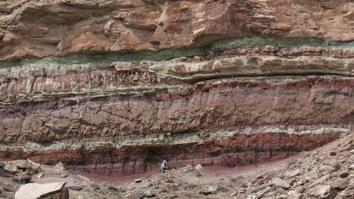 Matt Joeckel, Conservation and Survey Division director, is seen mapping the Yellow Cat Formation of the Cedar Mountain Formation in Utah. | Photo courtesy Jim Kirkland, Utah Geological Survey