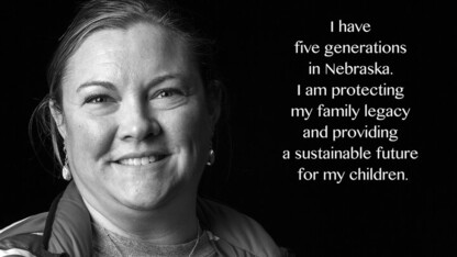 A photograph from the exhibit says "I have five generations in Nebraska. I am protecting my family legacy and providing a sustainable future for my children."