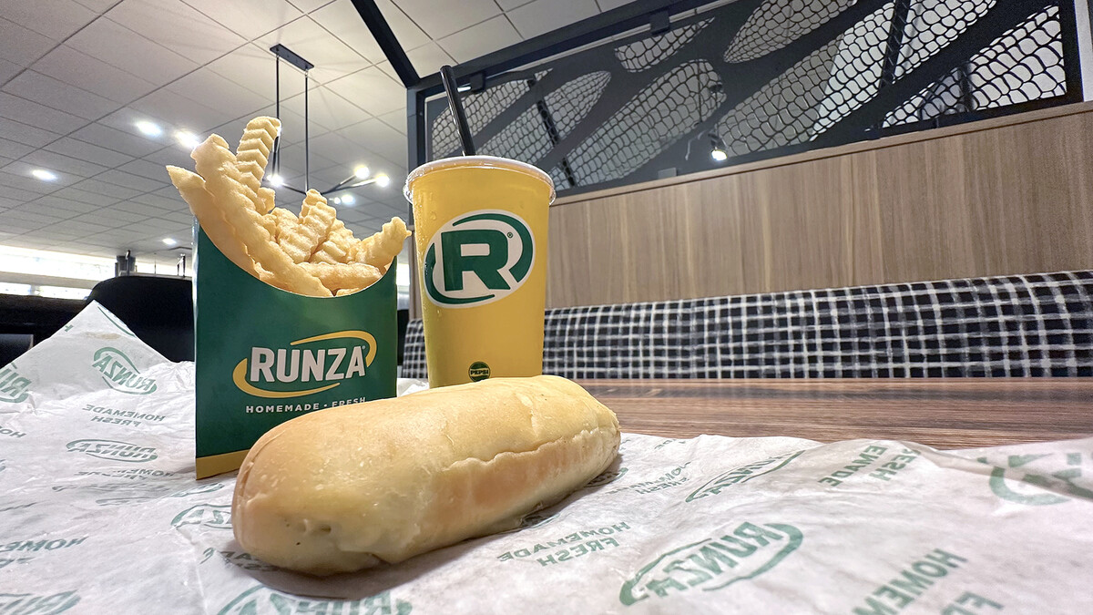 Photo of a Runza sandwich, french fries and soda on a table in the Selleck Hall food court. The University of Nebraska–Lincoln's Selleck Hall food court will open a Runza franchise this fall.