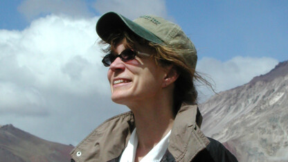 Sherilyn Fritz, pictured here at Aconcagua in South America, will will co-direct an international organization that helps study Earth’s past to inform the management of its future.
