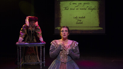 Tamara Meneghini, associate professor of theatre at University of Colorado (left), plays Queen Elizabeth I, while her lady-in-waiting (Colorado student Bernadette Venters-Sefic), in a performance written by Nebraska historian Carole Levin. The play will be performed at the University of Nebraska–Lincoln Feb. 25 and 26.