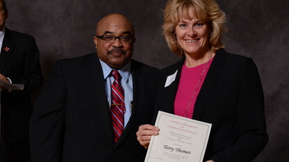 Terry Thomas (right), a volunteer with the University Health Center, receives a contribution to students awards during the 2015 ceremony in the Nebraska Union. The 2016 ceremony is 3 to 5 p.m. Jan. 29 in the Nebraska Union.