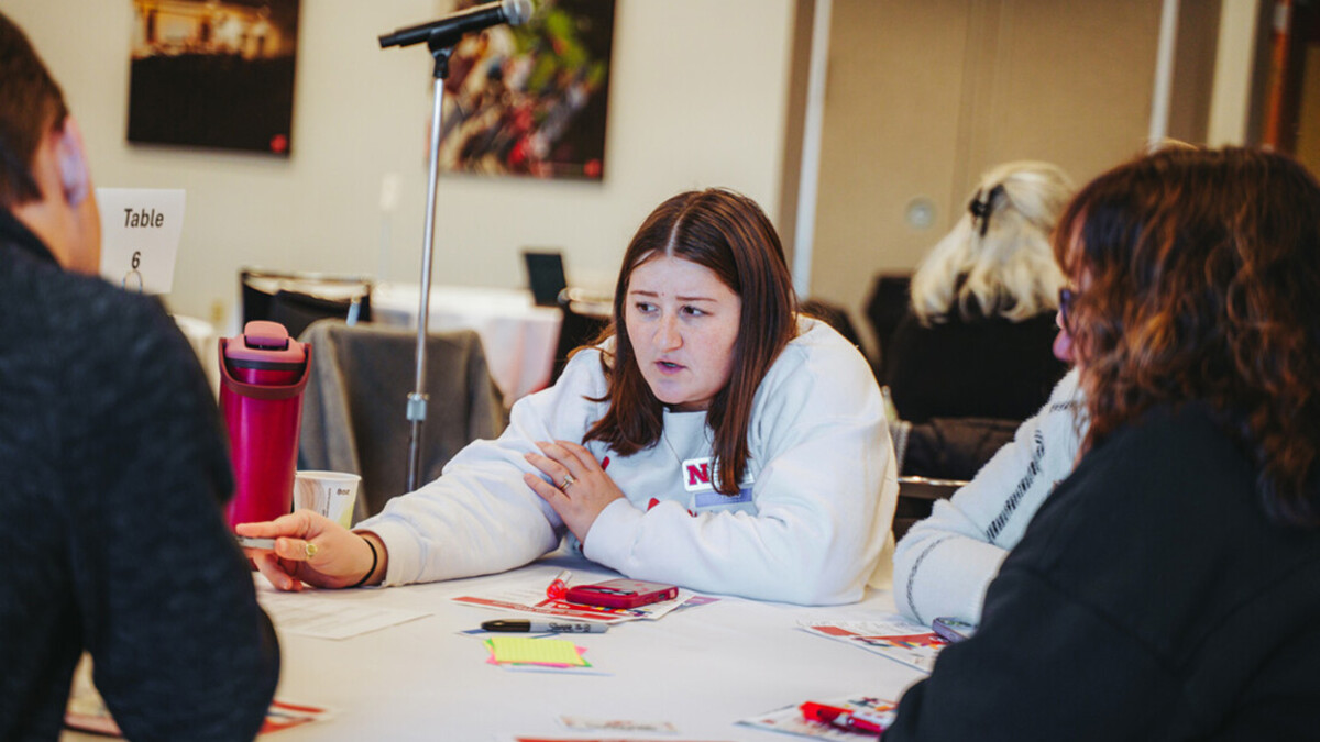 Participants work through an exercise during an HR workshop.