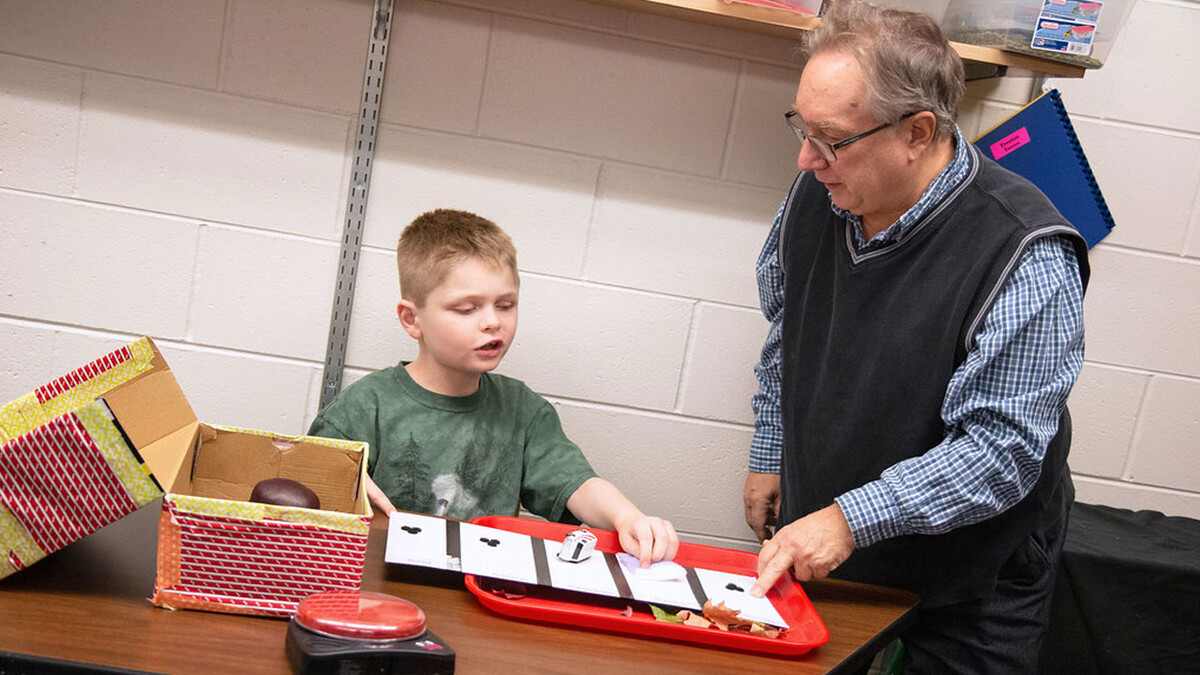 An instructor works with a young student at the Nebraska Center for the Education of Children who are Blind or Visually Impaired in Nebraska City. (Kyleigh Skaggs, CYFS)