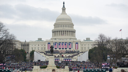 Visitors watch the inauguration of President Donald Trump on Jan. 20 in Washington, D.C. Nebraska's Mario Scalora assisted with threat assessment during the event.