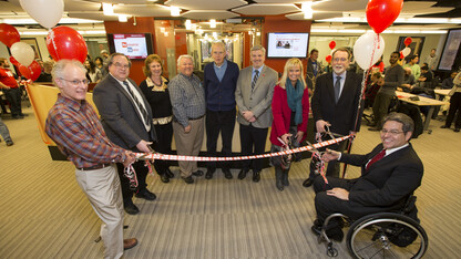 The Department of Chemistry celebrated the remodeling of Hamilton Hall's second floor chemistry laboratories and new resource center with a ribbon cutting. From left: Mark Griep, Dr. Jim Takacs, Peg Bergmeyer, Darrel Kinnan, Jim Carr, Jason Kautz, Alecia Kimbrough, Dan Hoyt and Lance Perez. 