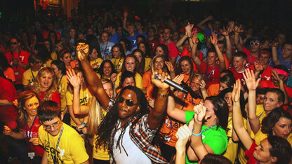 A DJ dances with students during the 2013 UNL Dance Marathon in the Nebraska Union. Due to space limitations, the event is moving to the Campus Recreation Center.