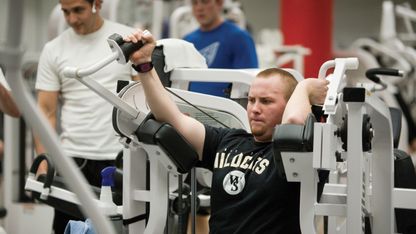 A student works out at the Campus Rec Center.