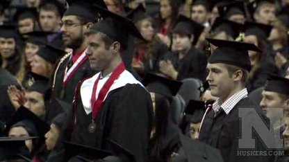 December 2013 grads stand for recognition during the Dec. 21 ceremony.