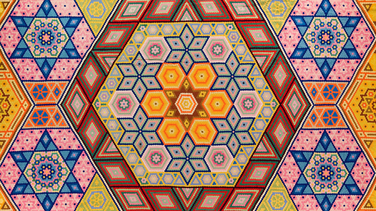 Grace Snyder's "Hexagon Mosaic" quilt, one of her two designs designated among the 100 best 20th-century quilts by Quilters Newsletter Magazine in 1999. She made the quilt in 1940. (Image No. 2009.032.0001)