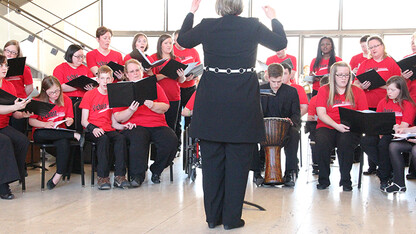 Rhonda Fuelberth, associate professor, directs the i2Choir in a performance at Sheldon Museum of Art.