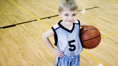 An eager athlete is ready to better his basketball skills