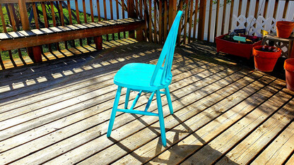 A view of Lisa Kort-Butler's bright, cheerful backyard deck — complete with a chair that offers a respite from COVID-19 related stress — has earned the Husker Home Office honor for the week of May 1.
