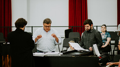 Tyler White (center) rehearses with Patrick McNally (left) and Matthew Gerhold. The Glenn Korff School of Music is premiering a new opera “The Gambler’s Son” by composer Tyler Goodrich White and librettist Laura White. 
