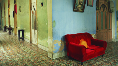 Detail of Michael Eastman's "Red Couch, Havana" photograph, which is featured in a new exhibition at Sheldon Museum of Art.