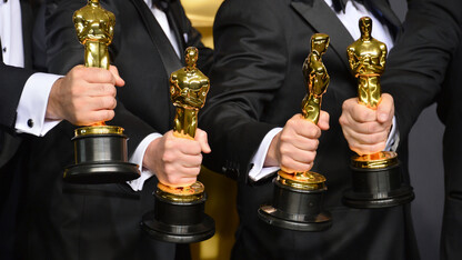 Winners holding Oscar statuettes