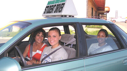 Nebraska students taking part in a driver's ed program pose for a photo. A study by UNL researchers found that driver's education courses significantly reduce crashes and traffic violations among new drivers.