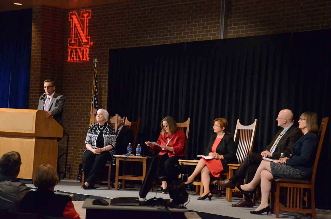 Ronnie Green, (standing, far left) vice chancellor of the Institute of Agriculture and Natural Resources, talks during the Heuermann Lecture on April 22. The event featured a panel that included (seated, from left) Marjorie Kostelnik, Joan Lombardi, Nurper Ulkuer, Chris Elias and Helen Raikes.