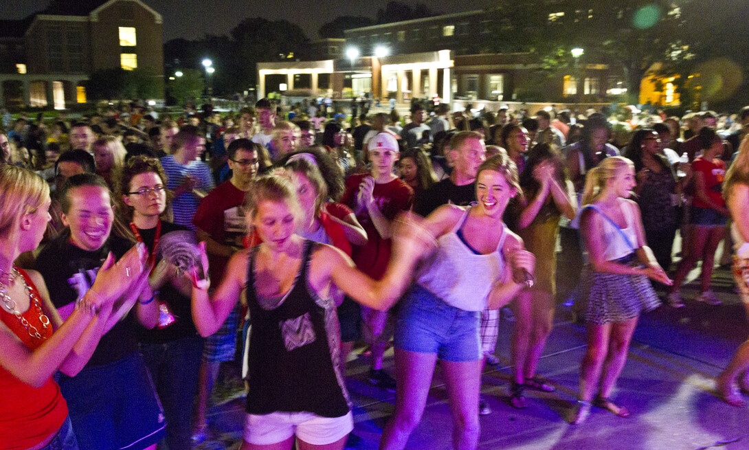 Students dance during a Big Red Welcome concert held on the greenspace north of the Nebraska Union on Aug. 23, 2013. The space will be used for a free April 9 concert featuring Big Sean and XV.