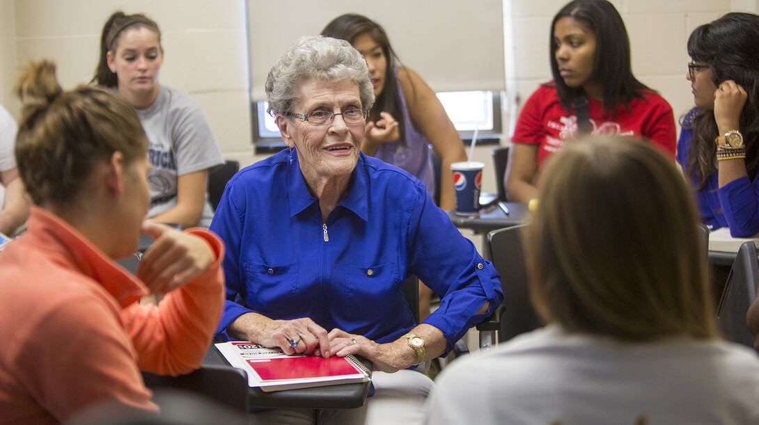 Jean Kops talks with students in a class during her junior year at UNL. Kops will graduate from UNL during commencement exercises on Aug. 15.