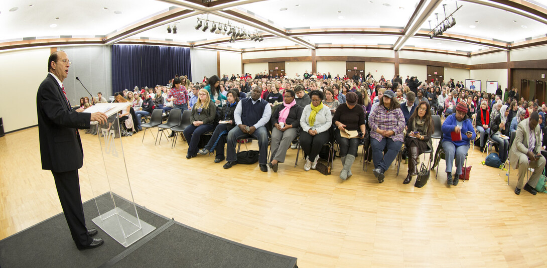 Vice Chancellor for Student Affairs Juan Franco speaks to the more than 550 students, faculty and staff who turned out for the kickoff of the "Not Here, Not Now, Not Ever" campaign. 