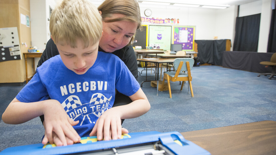 A teacher works with a student in the Nebraska Center for the Education of the Blind in Nebraska City. A UNL researcher has earned a $1.1 million grant that will be used to teach 30 graduate students to teach children and youth with sensory disabilities.