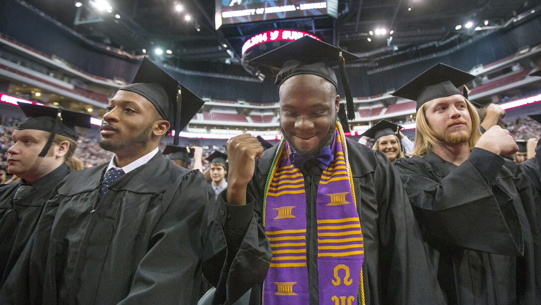 Nick Banks reacts after the newest class of UNL graduates moved their tassels on their mortarboards during undergraduate commencement exercises Dec. 20 at Pinnacle Bank Arena. Nearly 1,500 students earn degrees during UNL ceremonies on Dec. 19 and 20.