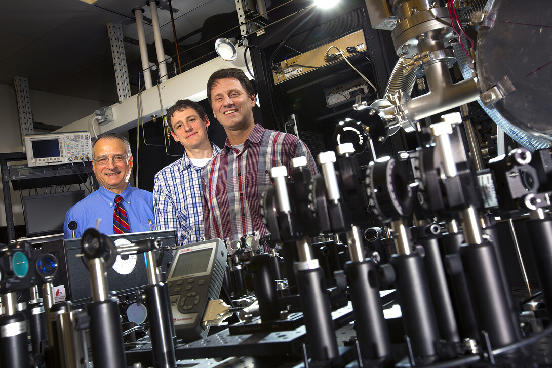 UNL physicists, from left, Anthony Starace, Martin Centurion and Herman Batelaan lead UNL’s work with the Nebraska-Kansas Consortium.