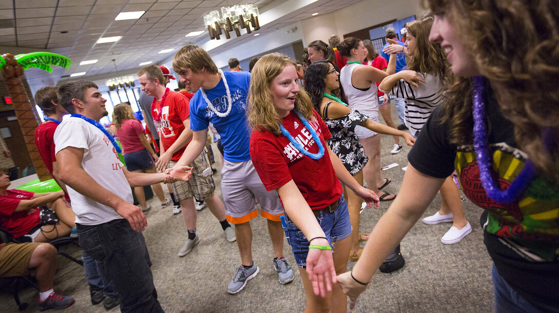 Students learn self-defense techniques as part of a personal safety presentation held during the College of Agricultural Sciences and Natural Resources' welcome back luau.