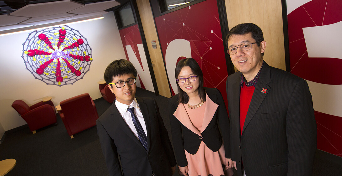 Researchers (from left) Chongqin Zhu, Yingying Huang and Xiao Cheng Zeng co-authored a study that has predicted the existence of a new form of ice.