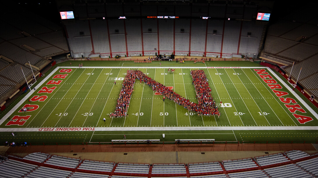 Members of the University of Nebraska–Lincoln's freshman class line up in the shape of an "N" during the New Student Tunnel Walk on Aug. 27. For the second year, enrollment at the university has surged to an all-time high.