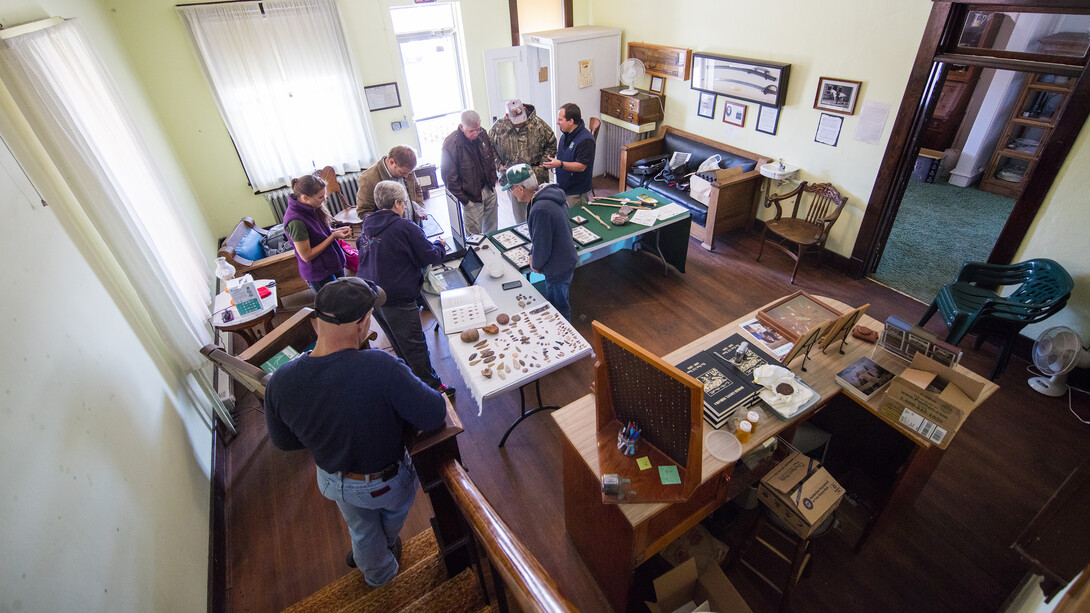 The lobby of Mullen’s Commercial Hotel, which now houses the Hooker County Historical Society, was the site for an Artifacts Roadshow put on by Matt Douglass and the U.S. Forestry Service.