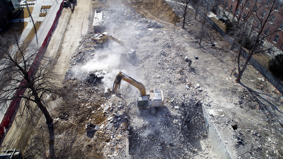 Excavators move rubble on the Cather-Pound implosion site. All rubble is expected to be removed by the week of March 5.