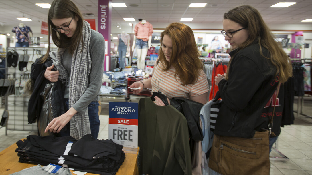 Students pick up discounted professional clothing at a 2018 Husker Suit-Up event.