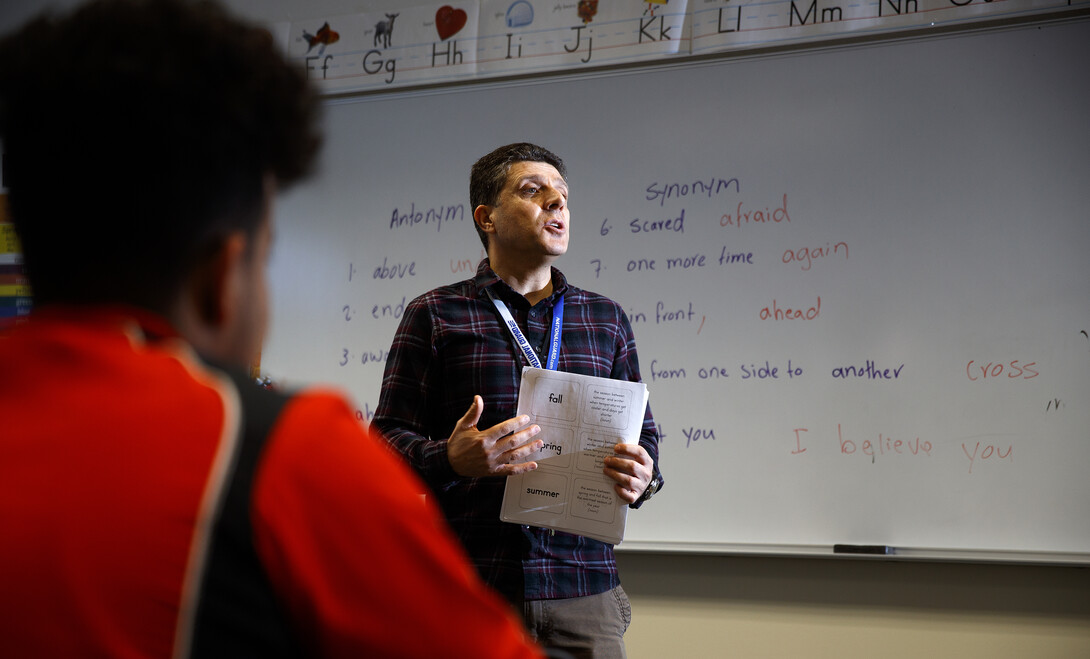 Hadi Pir teaches his class at Lincoln North Star High School