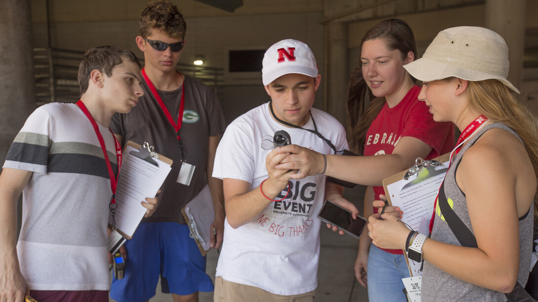 University of Nebraska-Lincoln student Maddy Diedrichsen (second from right) works with high school students on a microclimate project in Memorial Stadium June 14. The high school students attended Nebraska's National Weather Camp, June 10-15.