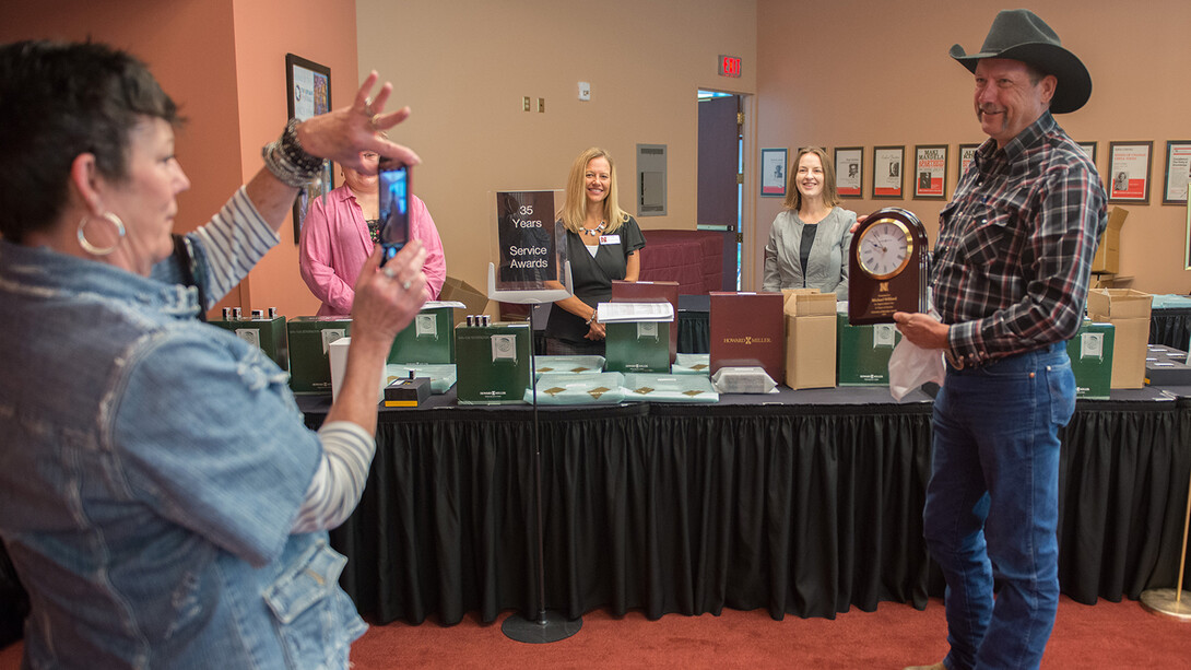 Michael Wilford poses with his 35 years of service honor prior to the 2018 Service Awards ceremony. Nearly 1,000 faculty and staff will be honored during the 2019 event at the Coliseum.