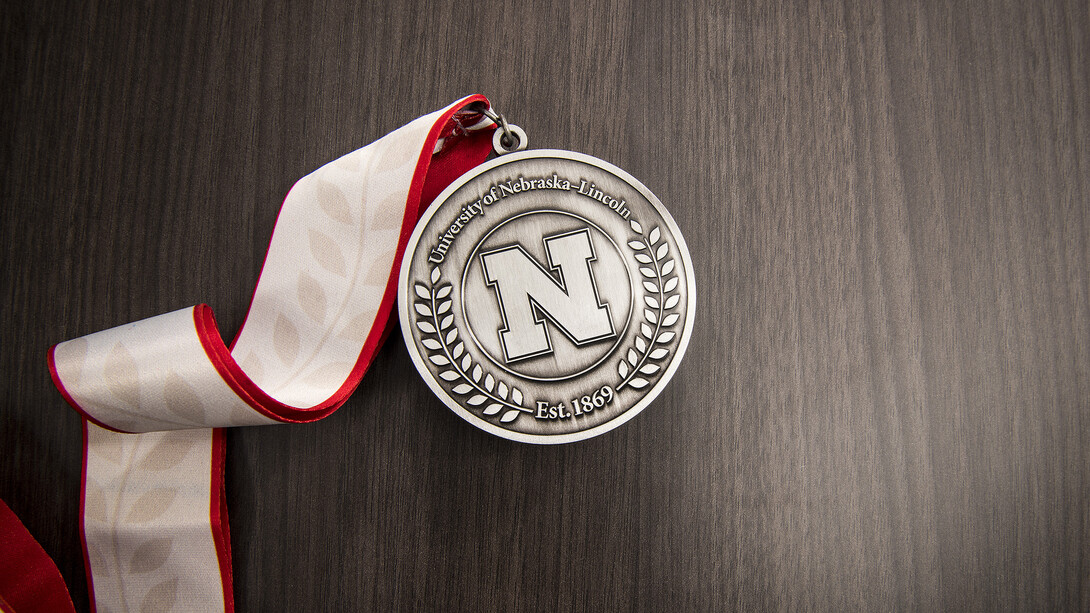 All current faculty who have earned professorships from the Office of the Executive Vice Chancellor received this medallion during a ceremony on Nov.