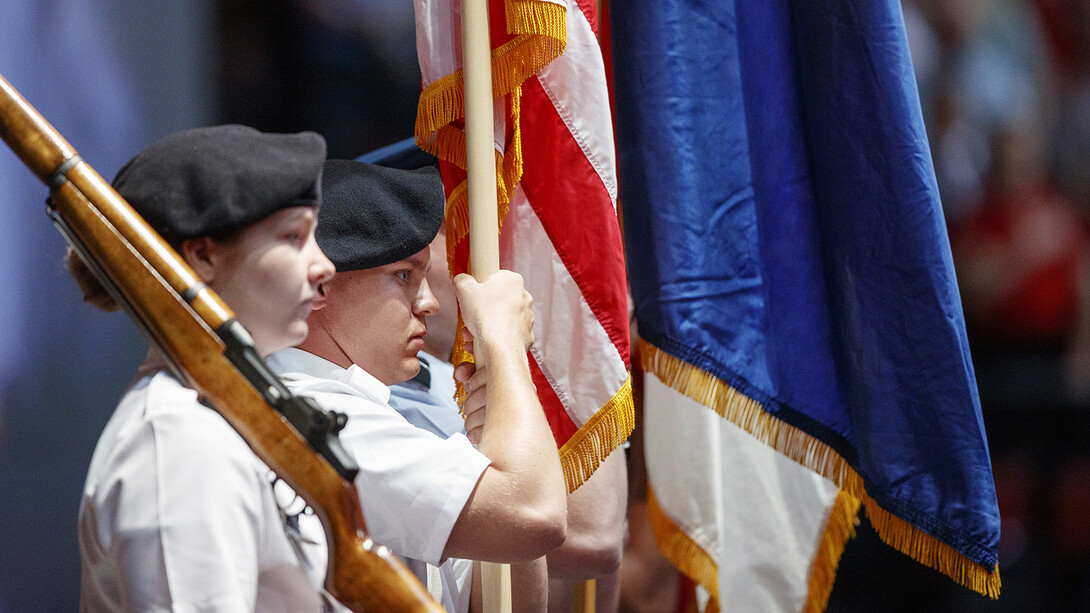 The color guard of the university's combined ROTC units participates in undergraduate commencement at Pinnacle Bank Arena on May 4. In observance of Veterans Day, the university will hold a roll call of all Nebraska veterans who have died in conflicts from World War I through today.