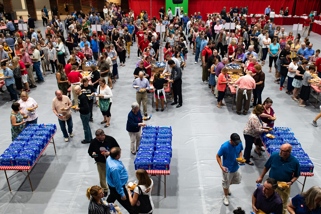 The crowd gathers to pick up their lunch at the Service Awards Celebration in the Coliseum, Sept. 18, 2019.