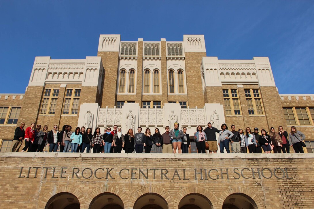 Students from UNL's William H. Thompson Scholars Learning Community pose in front of Central High School in Little Rock, Ark., during their civil rights-focused service learning trip.